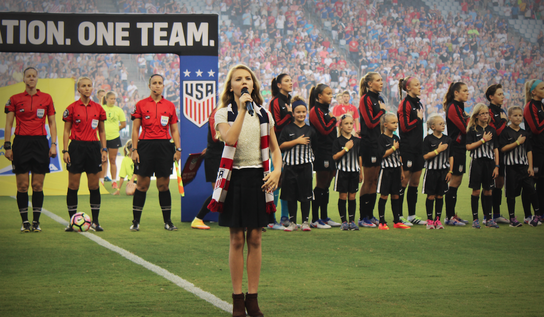 Tegan Marie Turns Heads with Stunning National Anthem Performance in Kansas City