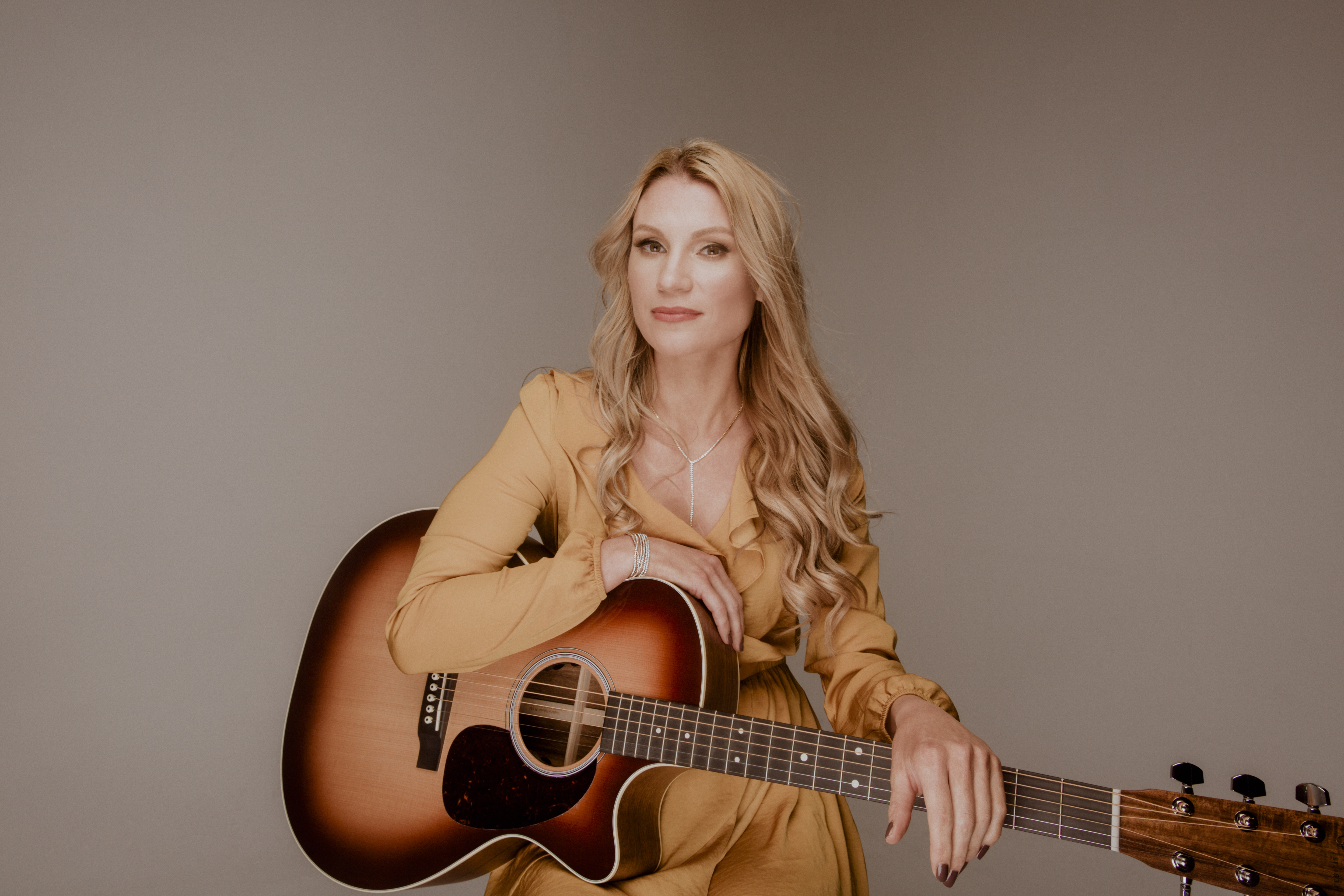 Get to Know Military Vet Turned Country Singer Jenny Leigh Miller with Debut Song “Driving With the Top Down”