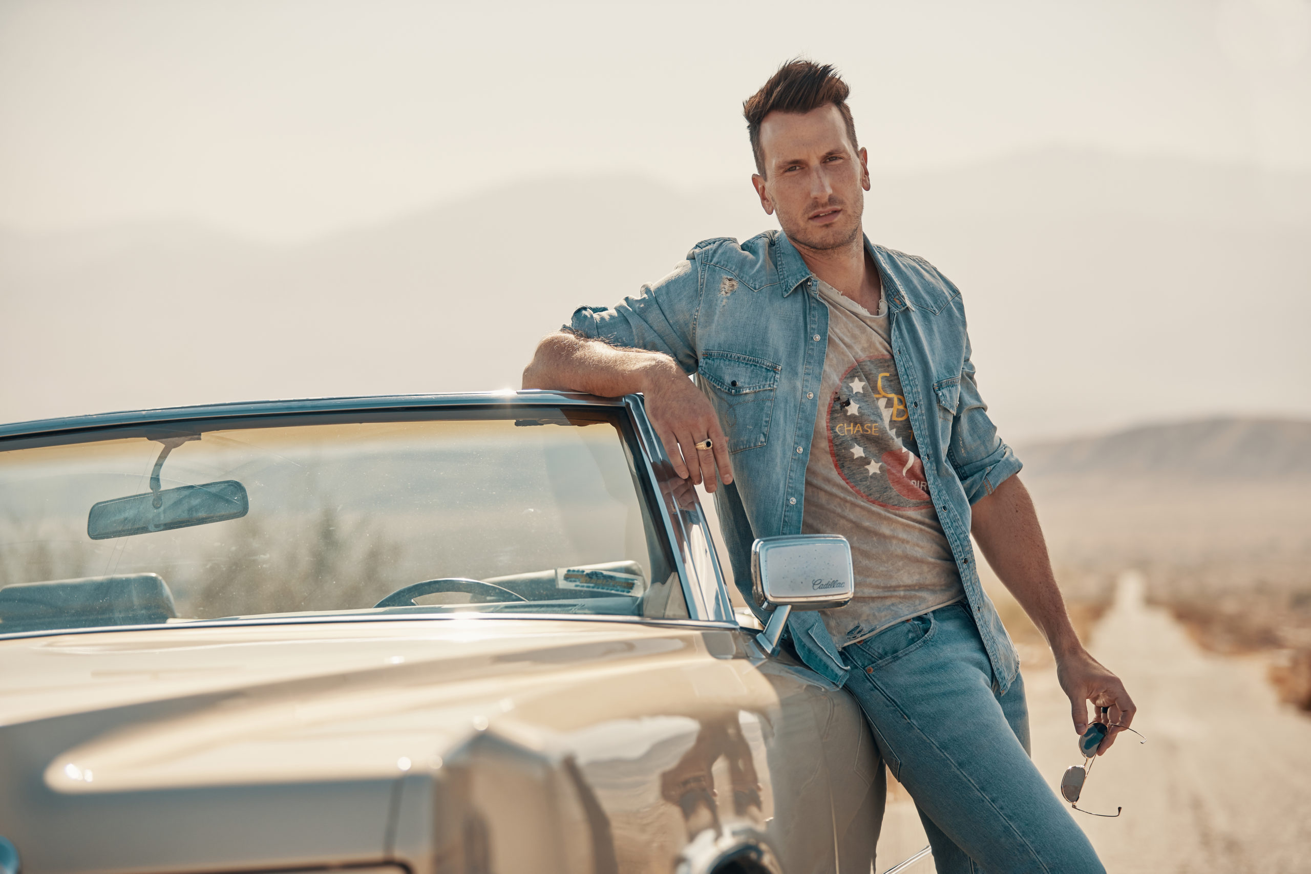 Russell Dickerson Surprises One of His Biggest Fans in the Best Way Possible this Holiday Season