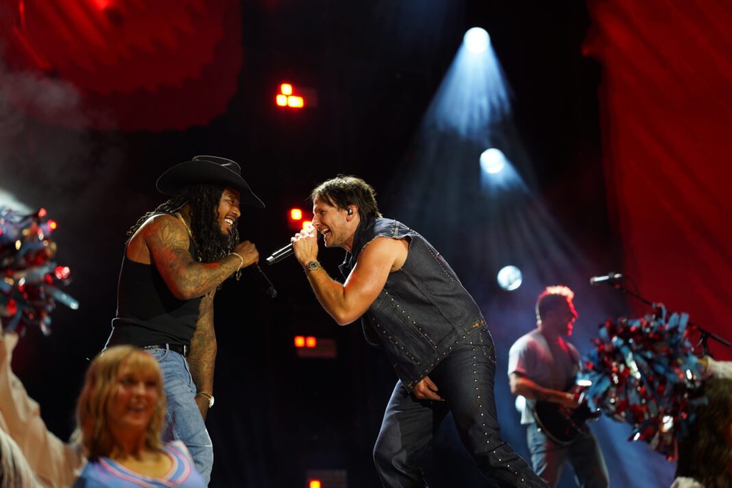 Russell Dickerson is Smashing Country Boundaries: Inside His Whirlwind Month From the AMAs to a History-Making CMA Fest Russell Dickerson is Smashing Country Boundaries: Inside His Whirlwind Month From the AMAs to a History-Making CMA Fest